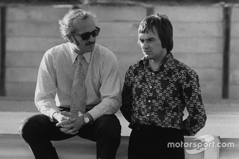 F1 South African Grand Prix 1972. Colin Chapman with Bernie Ecclestone, Brabham.